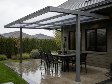 Modern backyard with a grey aluminum patio cover kit and translucent polycarbonate roof panels